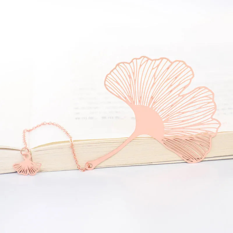 Brass bookmark with hollow-cut leaf design and matching rose gold metal tassel