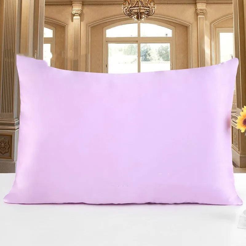 Double-sided silk pillowcase in apricot colour showing smooth satin weave texture.