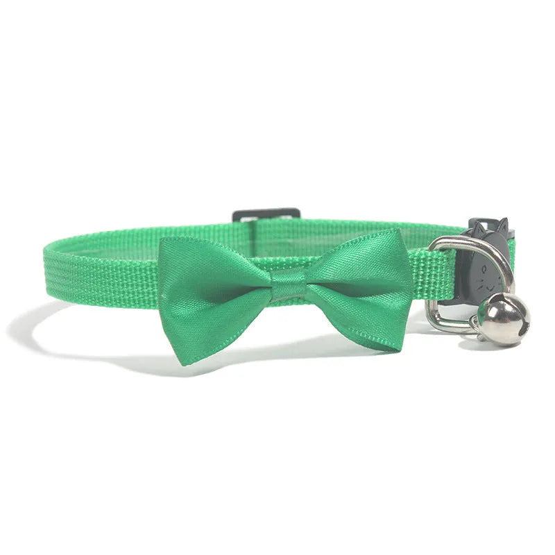 Striped multi-colour adjustable nylon cat collar with a small bell attached.