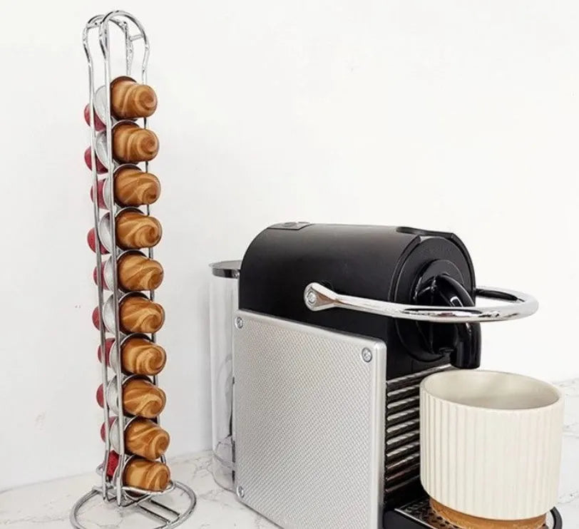 Wrought iron coffee capsule storage rack holding multiple pods with spray black finish