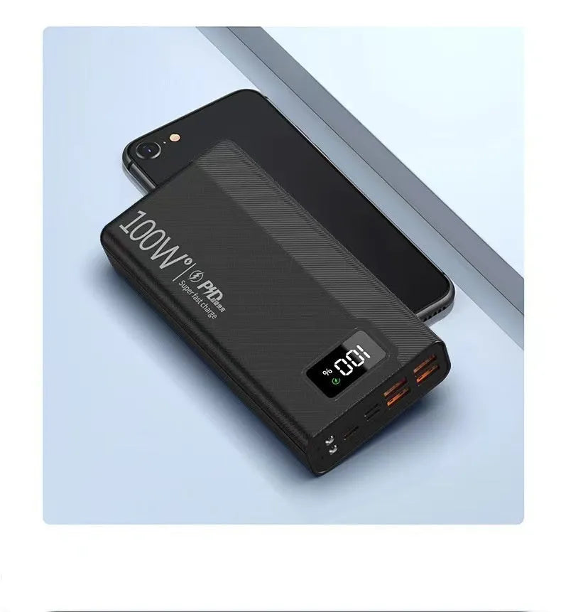 Black and white plastic power bank showing dimensions of 150 by 76 millimetres