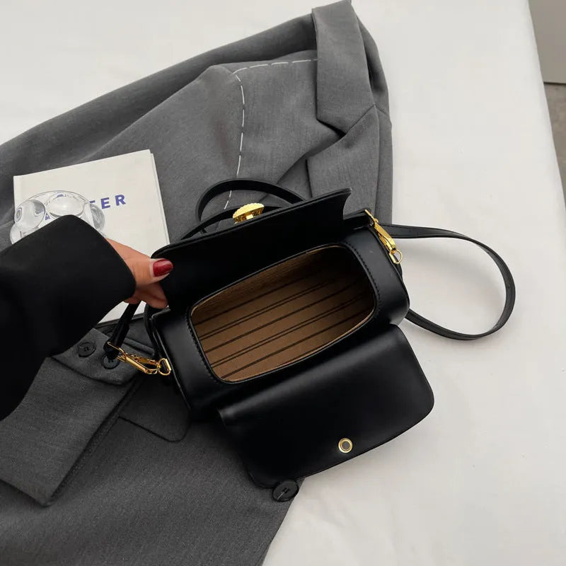 Women's casual shoulder bag with letter stitching in black PU leather