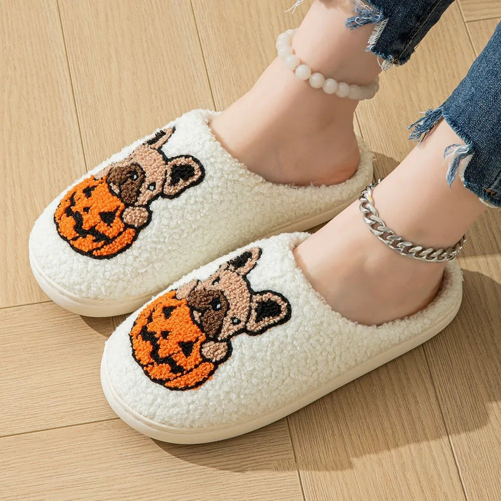 Halloween pumpkin house slippers in black with plush material and non-slip rubber soles