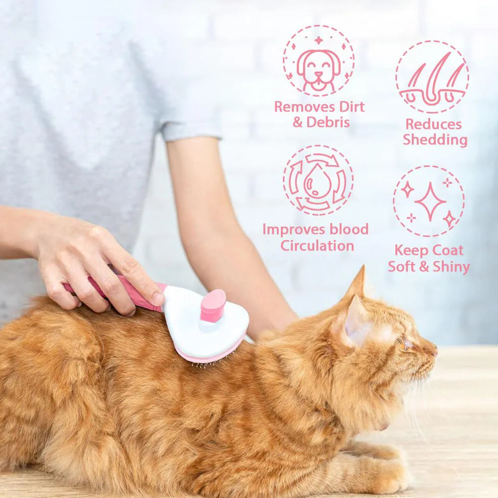Blue, grey, and pink cat brush with a release button and fine wire bristles for removing loose fur.