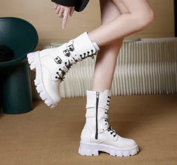 Women's black mid-calf knight boots with metal buckle detailing and side zipper closure