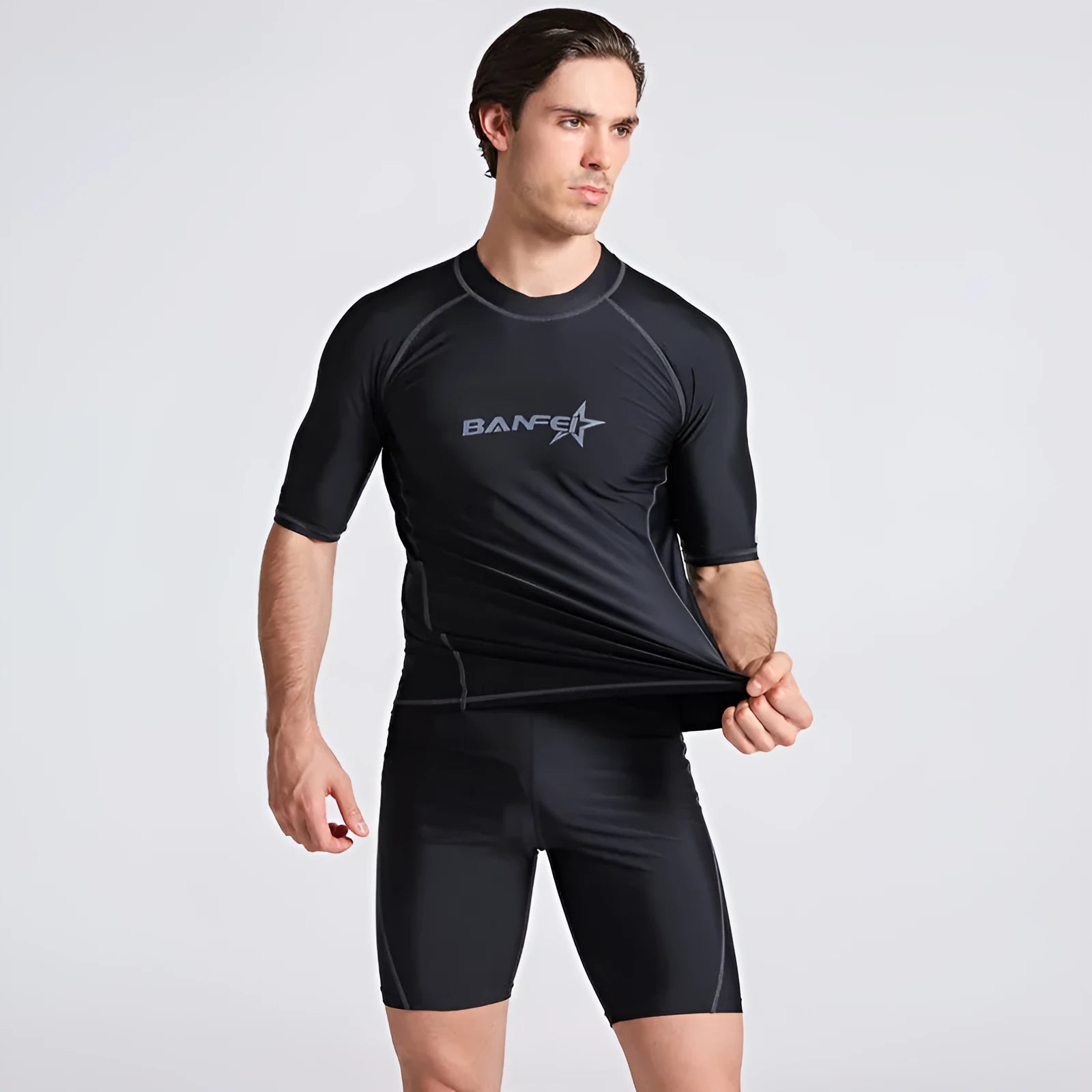 Men's half sleeve swimsuit wetsuit in nylon fabric for snorkelling and surfing activities