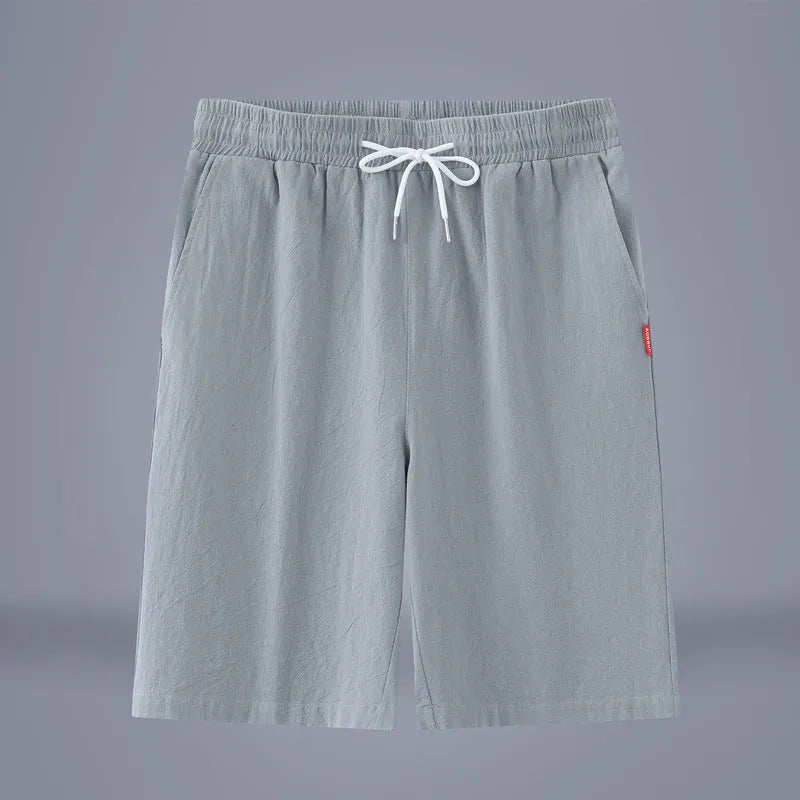 Chinese style solid colour cropped pants in cotton linen fabric on a neutral background.