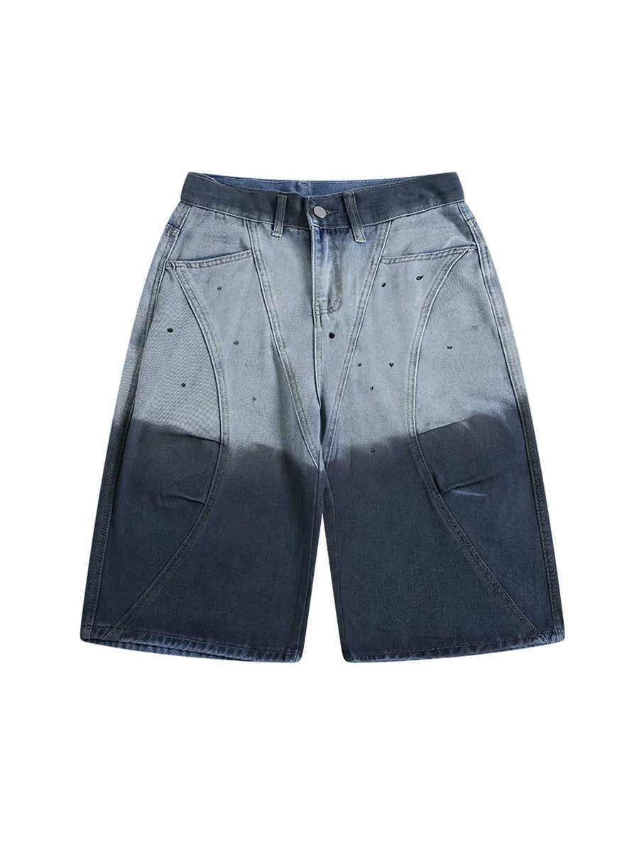 Blue tie-dye gradient washed-out cropped jeans with loose fit and worn looking finish