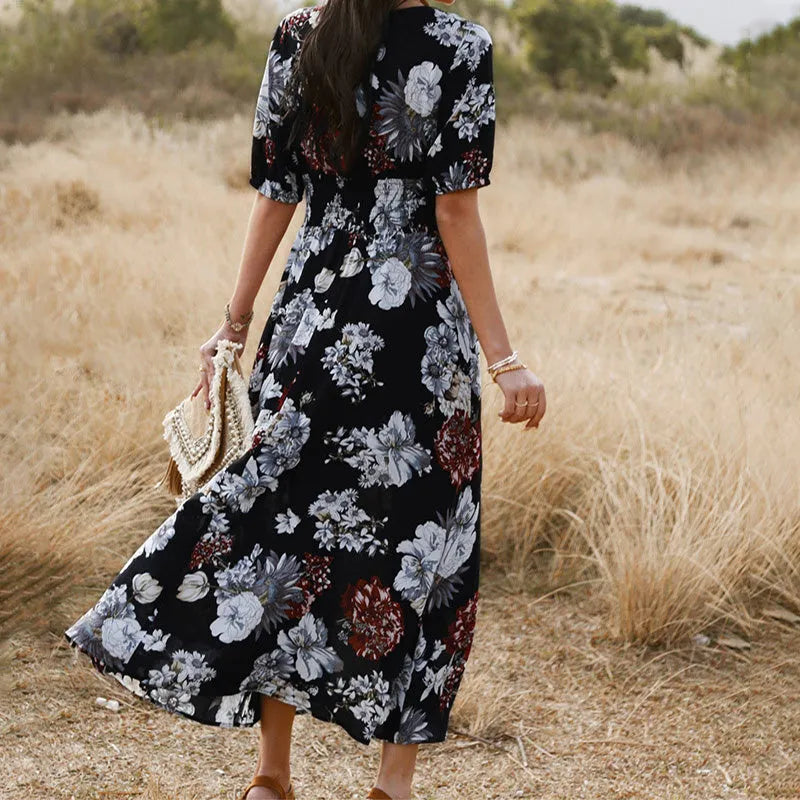 Women's floral summer beach dress with V neck and elastic waist in mid-length cut