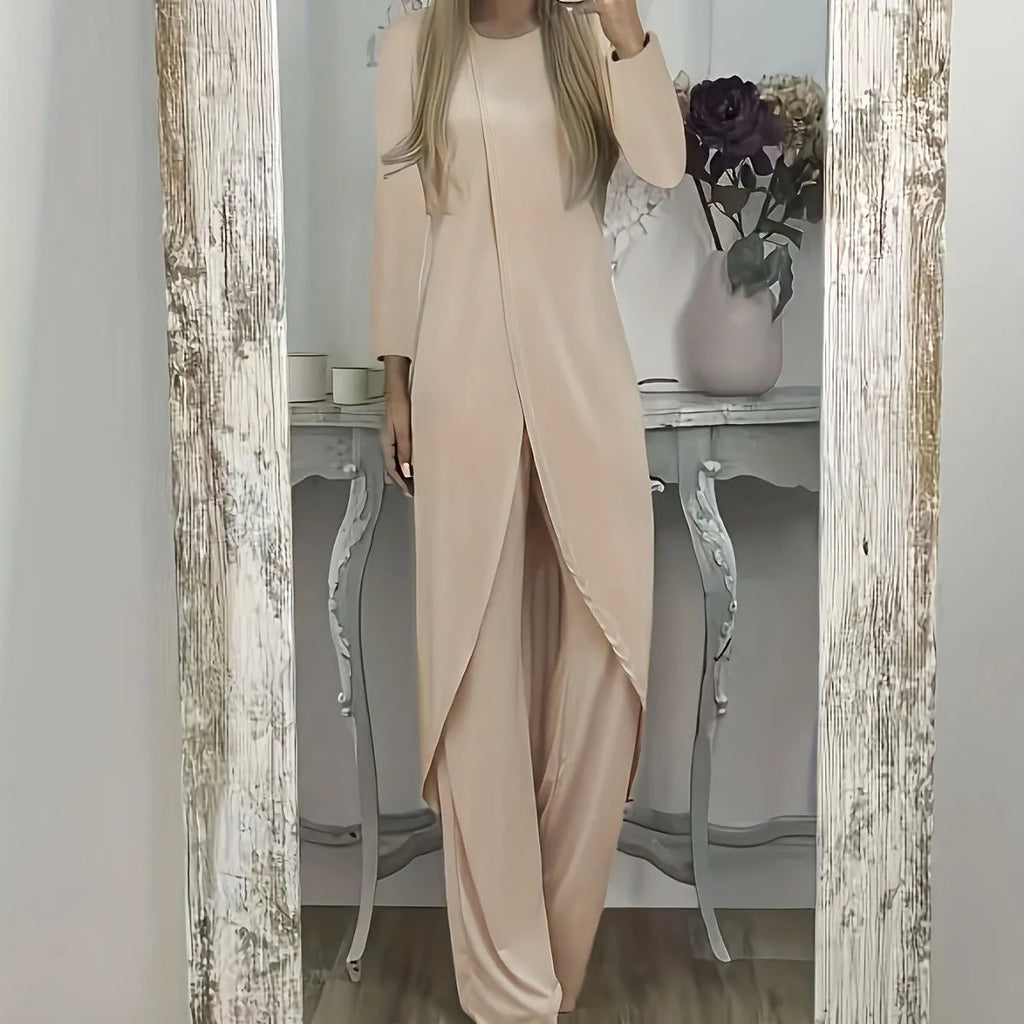 Casual black polyester two-piece lounge set with long sleeve top and loose trousers on a hanger.