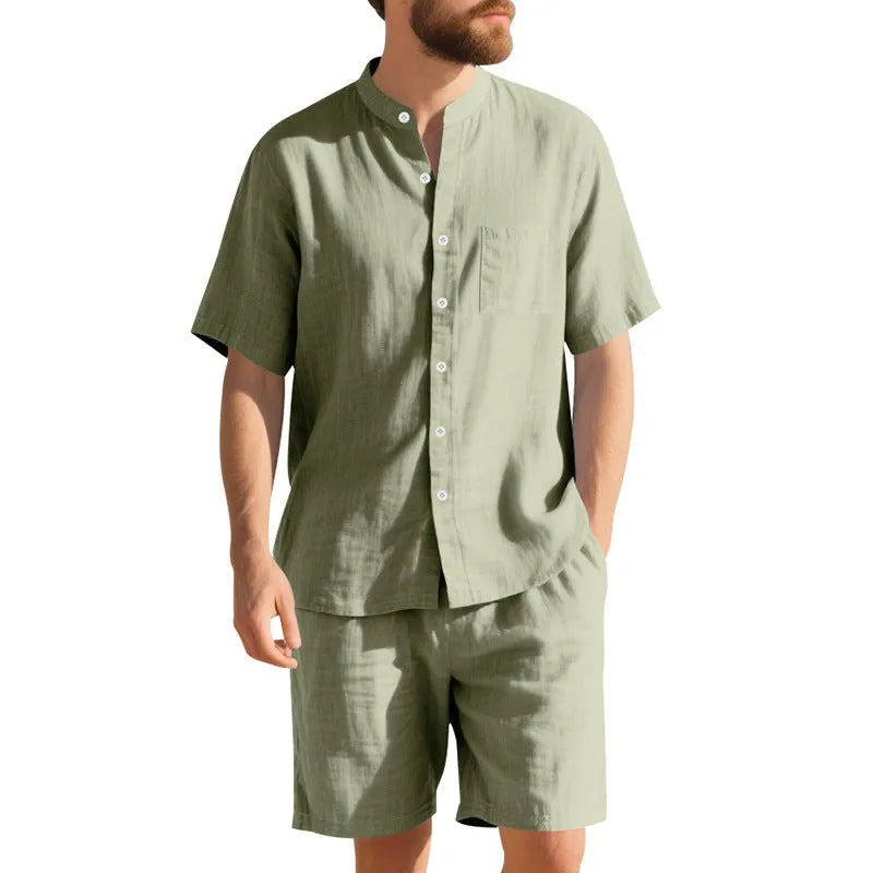 Men's light blue short sleeve linen shirt and shorts two-piece casual suit set on a hanger.
