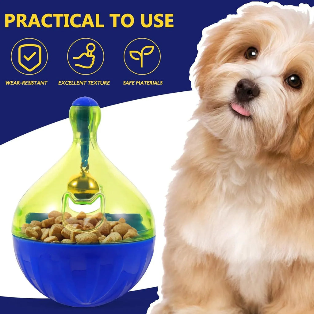 Blue tumbler-shaped pet treat dispenser toy for dogs and cats on wooden floor