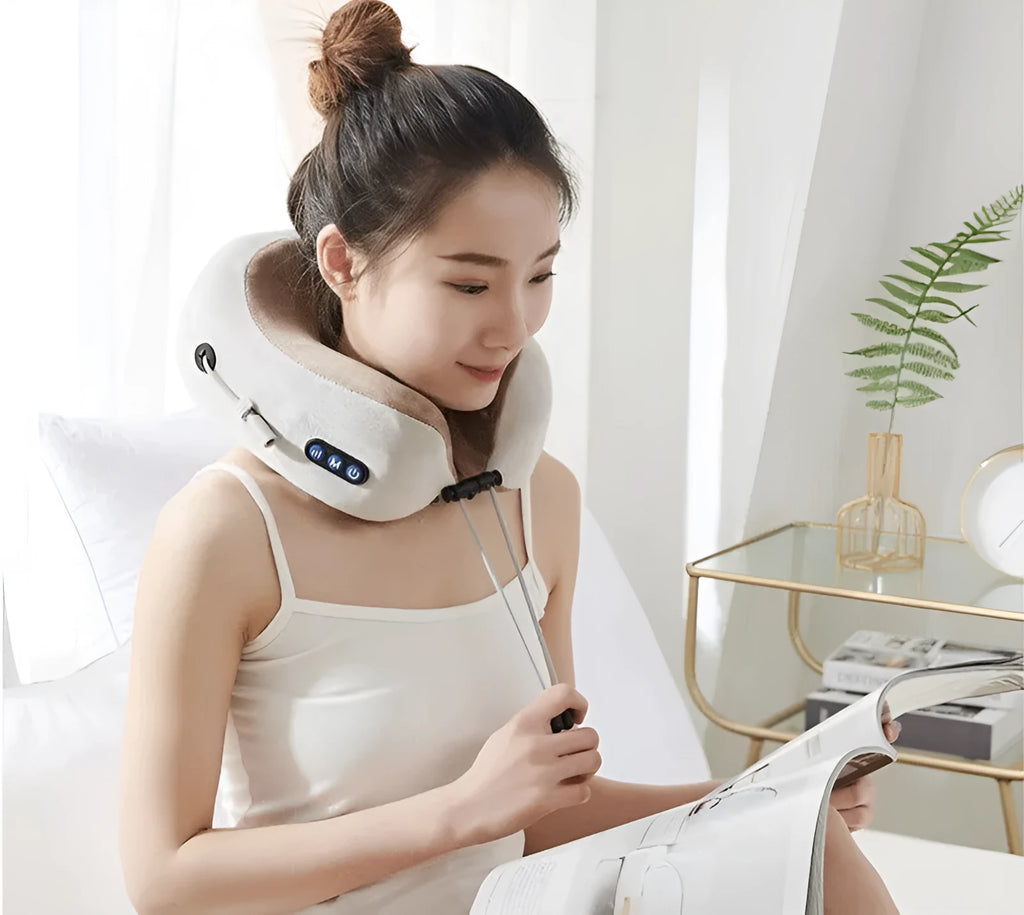 Brown U-shaped electric neck massage pillow with control buttons for kneading and heat functions.