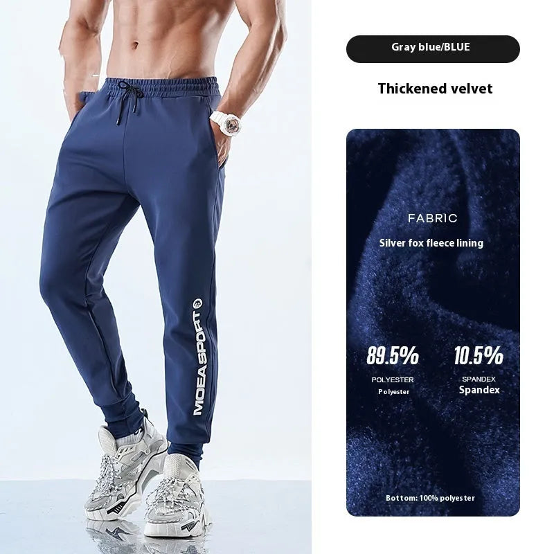 Men's black air layer ankle-tied sweatpants showing mid waist design and adjustable ankle ties