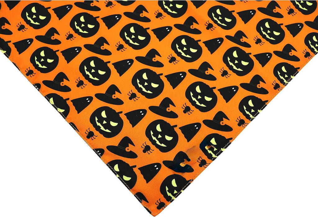 Black and orange reversible Halloween dog bandana with pumpkin and spider web patterns