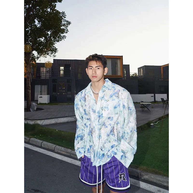 Blue floral long sleeve shirt with embossed three-dimensional pattern in loose fit chemical fibre blend fabric