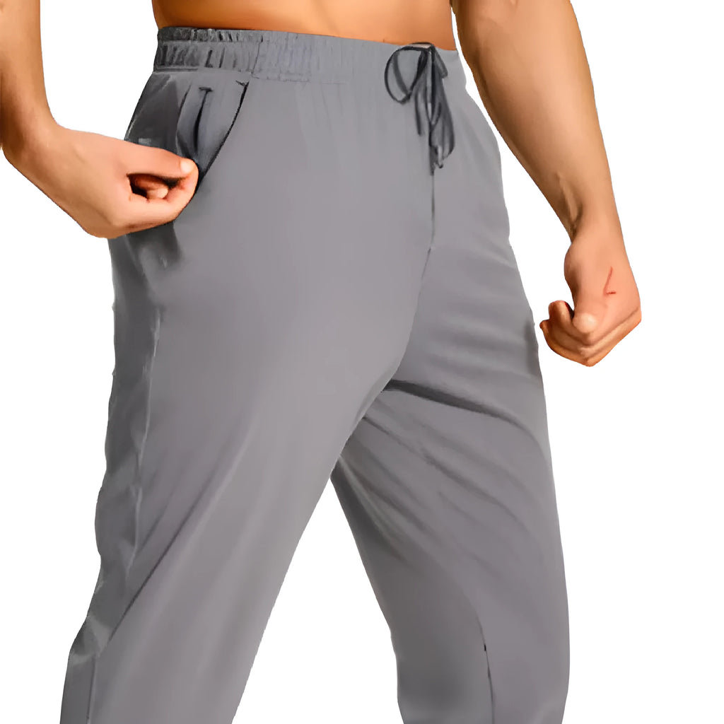 Men's loose fit casual trousers in polyester fabric available in multiple solid colours and sizes