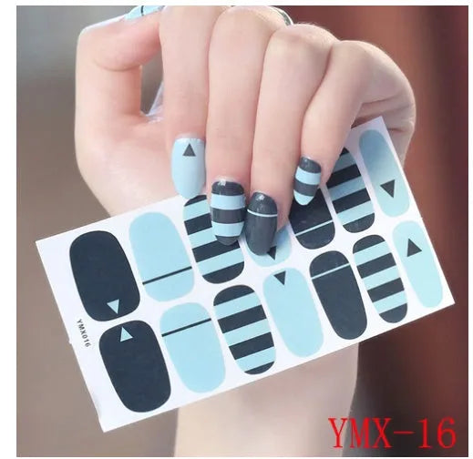 Full nail stickers set of 14 sheets showing 16 colour options in a flat lay arrangement