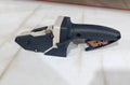 Blue multi-functional woodworking cutter with one-press lock for cutting gypsum board, foam board, and cardboard.
