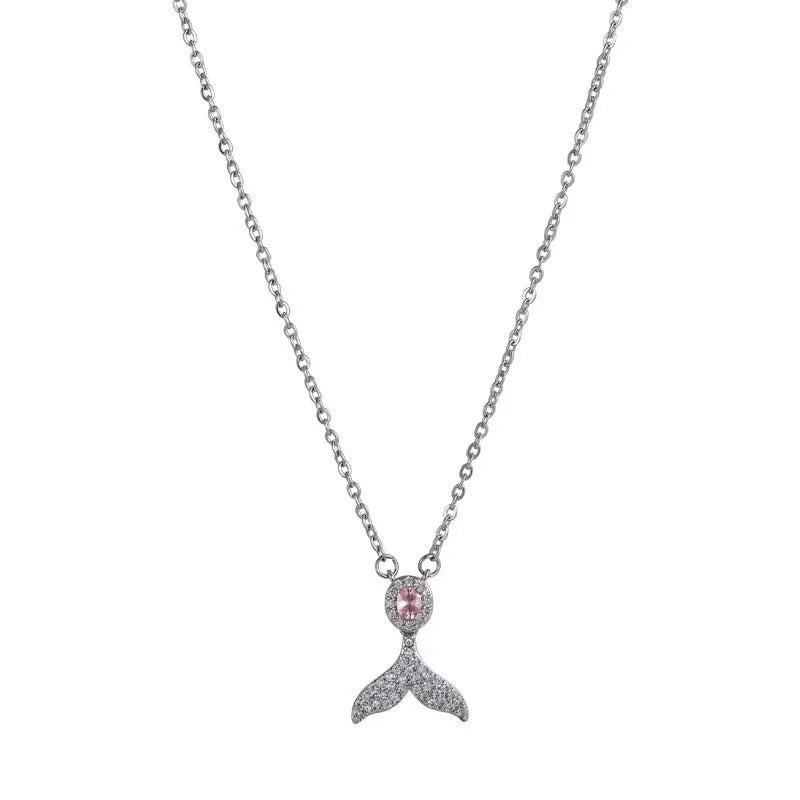 Close-up of a women's sterling silver necklace with a geometric fishtail pendant on an O-ring chain.