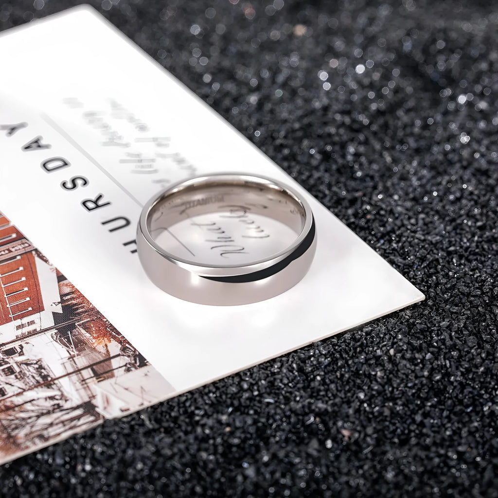 Simple silver titanium steel band ring shown in three width options: 2mm, 4mm, and 6mm.