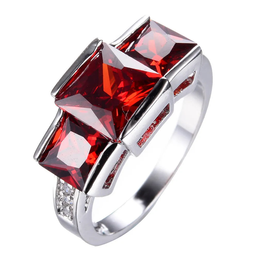 Geometric copper women's ring in champagne colour on a size no.8 finger, showing metal band and electroplated finish.