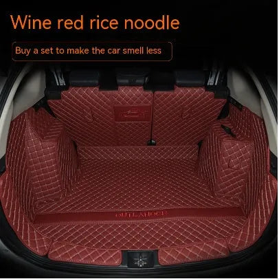 Mitsubishi Outlander 3D boot liner with high edges in a wine red colour with contrasting beige lines.