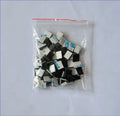 Black PA66 plastic automotive wire retaining clips for cable management in cars.
