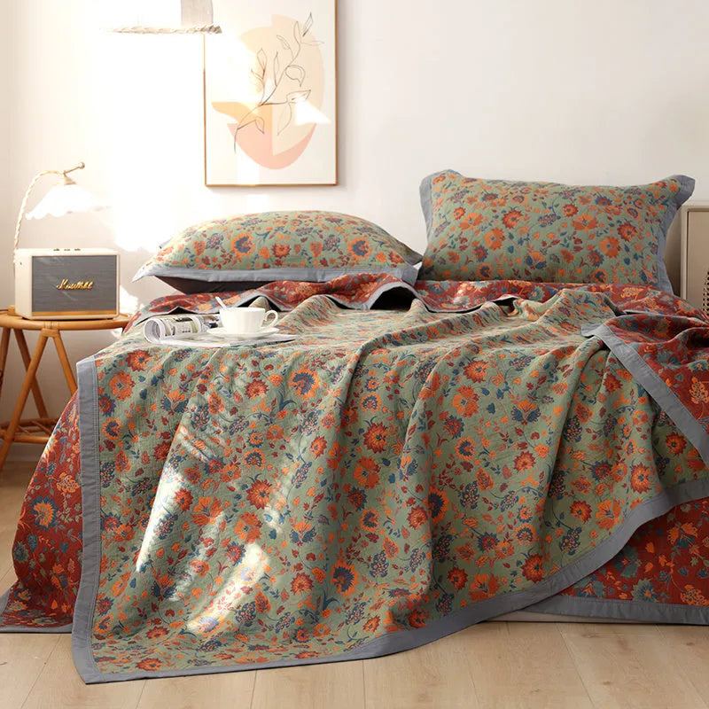 Cotton gauze bed blanket set with floral pattern including blanket and two pillowcases