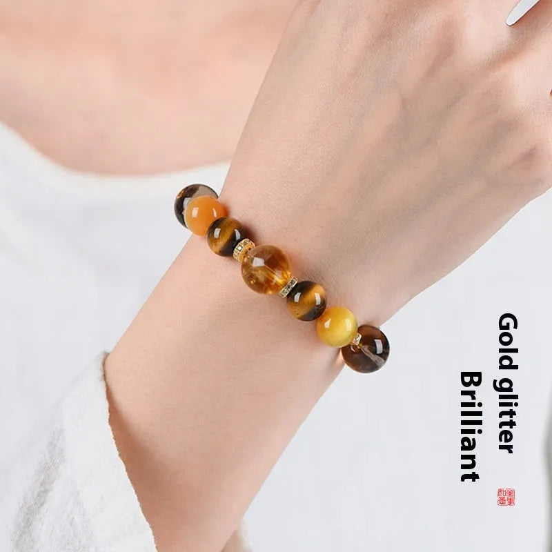 Natural yellow artificial crystal bead bracelet with 10mm Jinba beads in tower string design