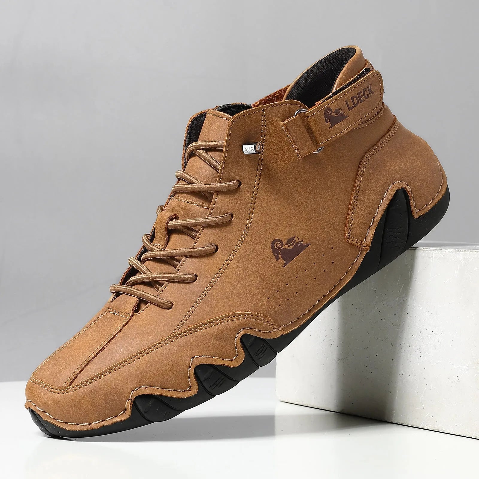 Men's khaki high-top octopus boots with microfiber upper and rubber sole shown on a white background