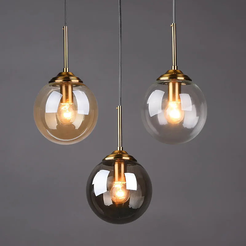 Modern round chandelier with glass balls in a Nordic style, mounted on a ceiling.