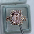 Rose gold electroplated alloy ring with geometric shape on white background