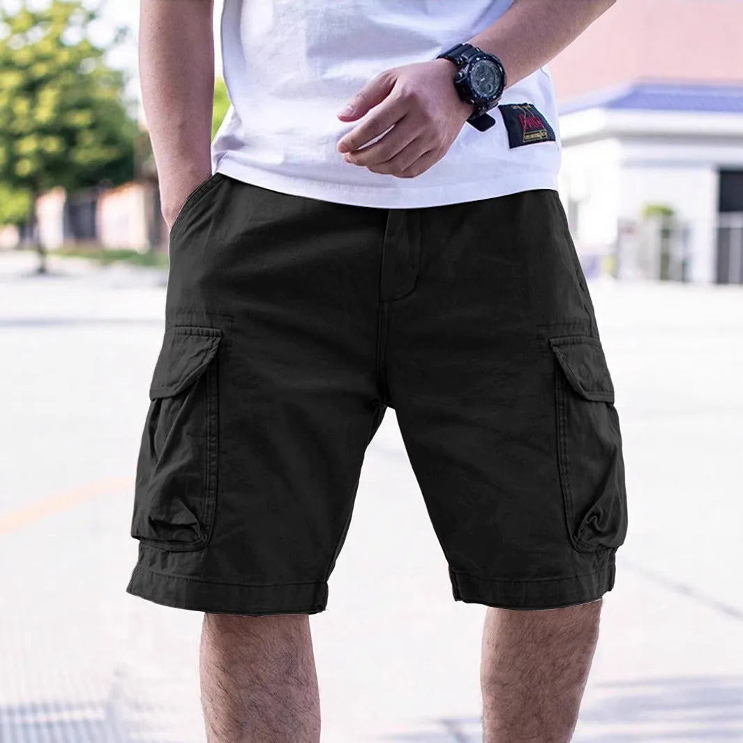 Men's loose fit cotton workwear shorts in Army Green colour showing retro style summer design