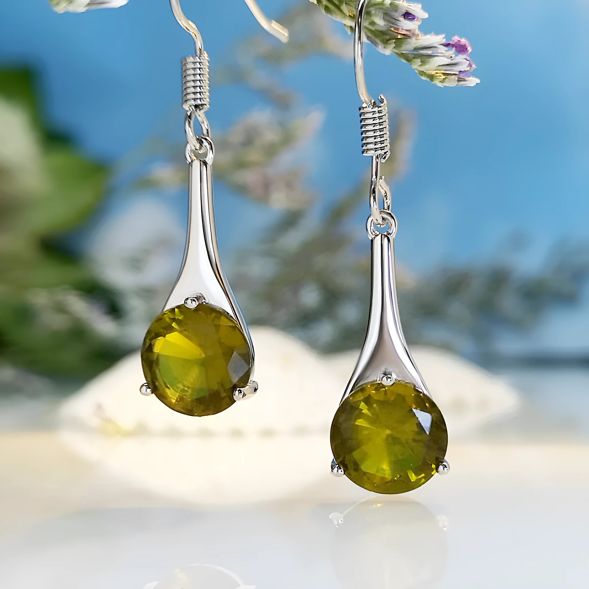 Olive green water drop shaped retro earrings with minimalist design on alloy base