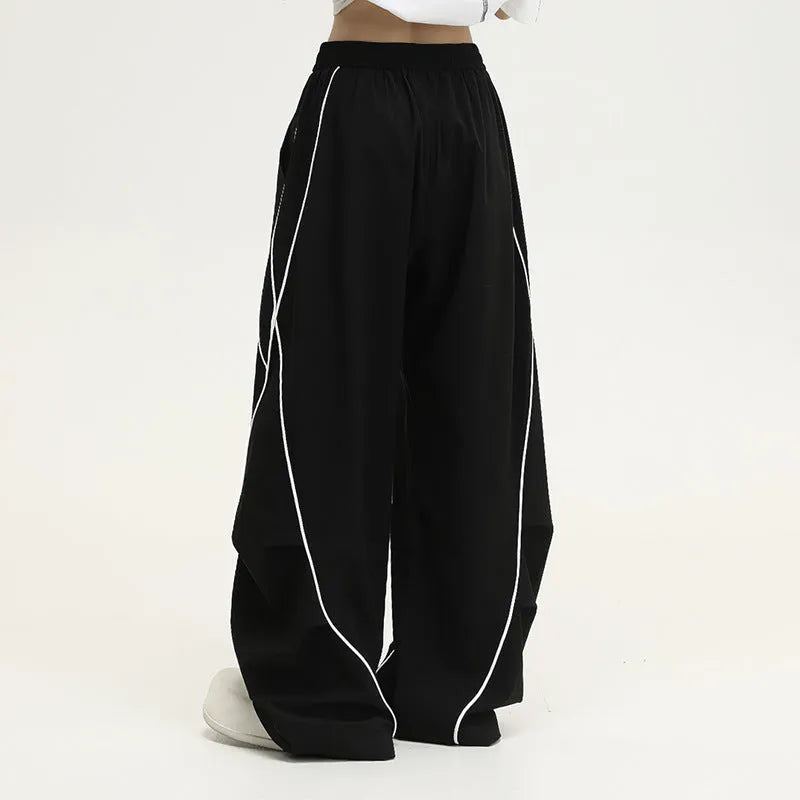 Black pleated wide-leg hip hop sports trousers with a striped pattern