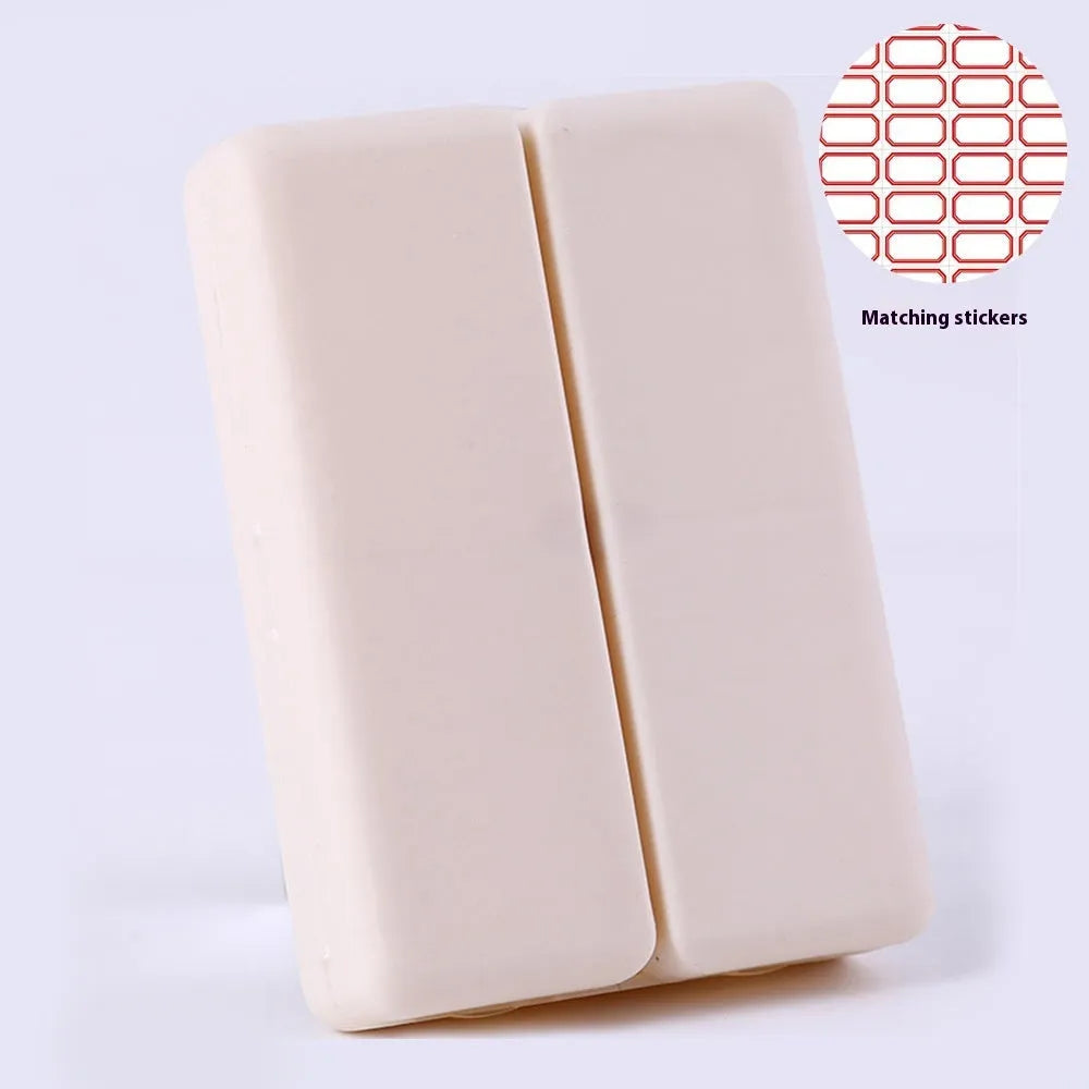 Four-color magnet 7-grid pill box in solid blue colour showing foldable covered design with seven compartments