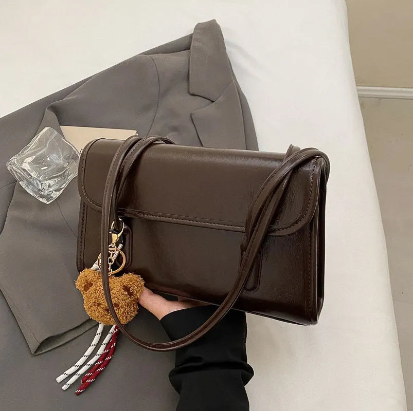 Women's brown Maillard PU leather shoulder bag with double straps and pendant attachment
