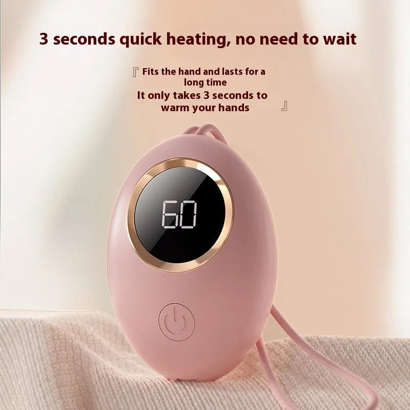 USB digital display hand warmer power bank in pink colour showing aluminium heat dissipation design.