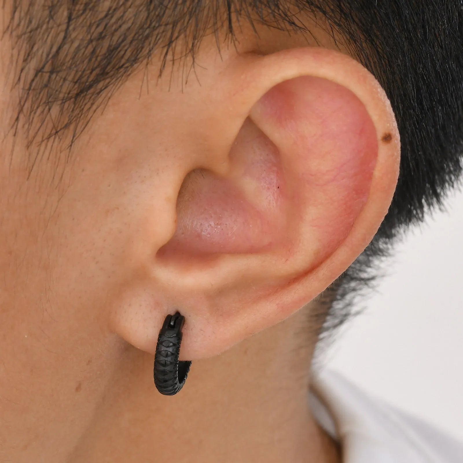 Black stainless steel earrings with snake pattern design for hip hop and punk jewellery styles