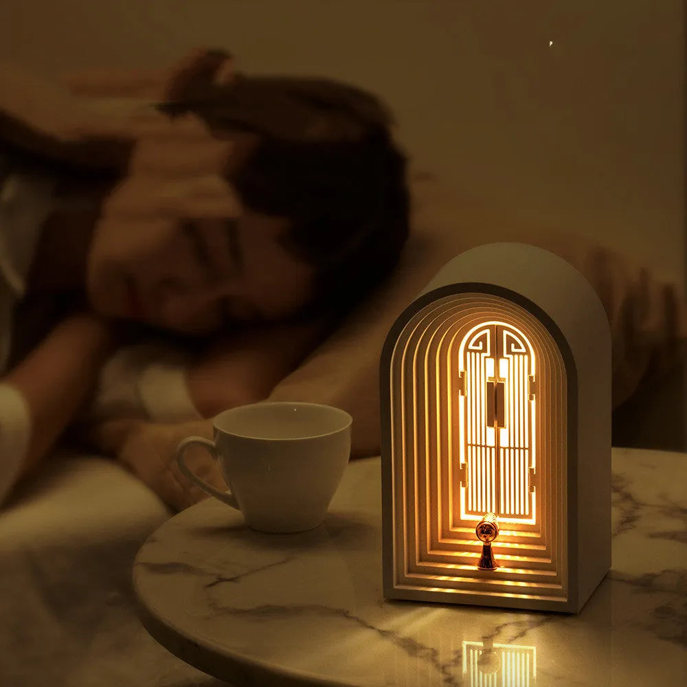 Nordic LED table lamp with Bluetooth speaker in white, plastic shade, compact bedside design