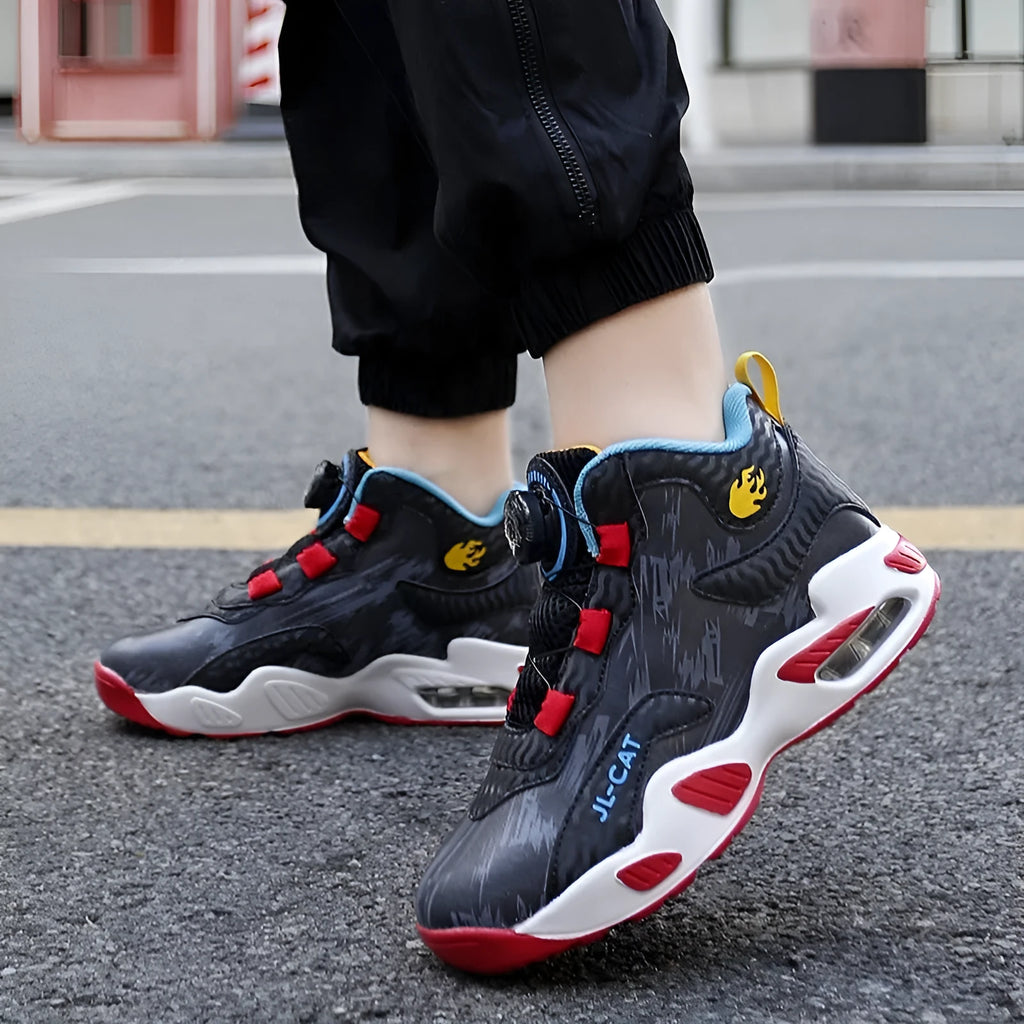 Children's rotating button closure basketball shoes in multiple colours with a PU sole.