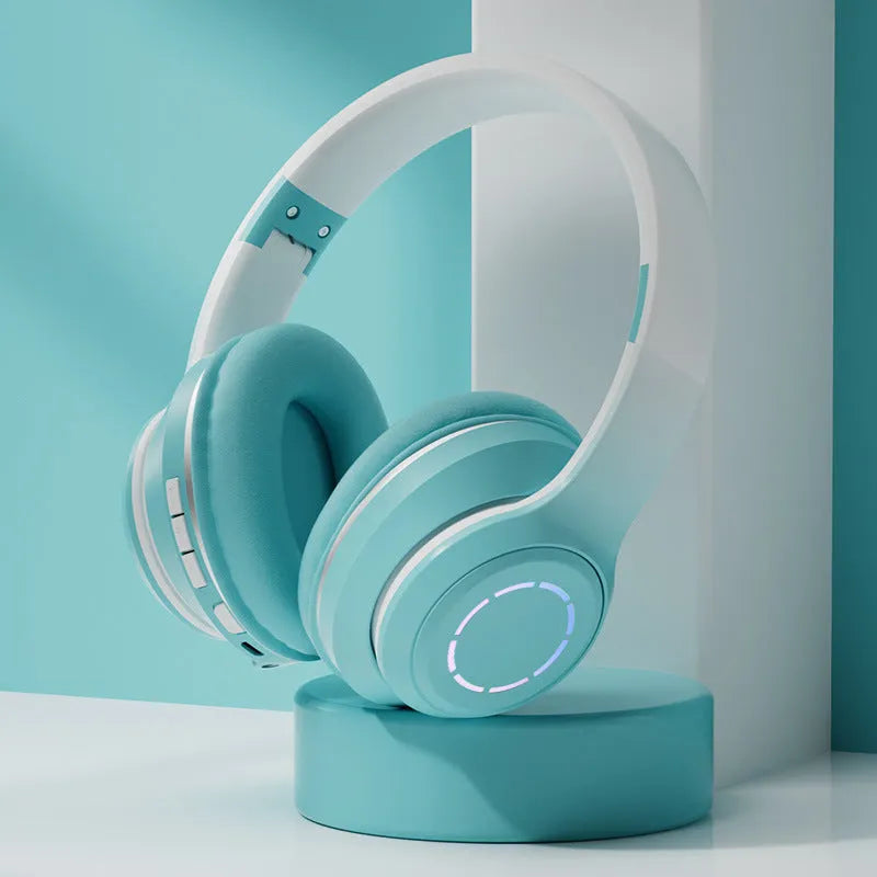 Gradient foldable wireless Bluetooth headset in blue with ear cushions and padded headband