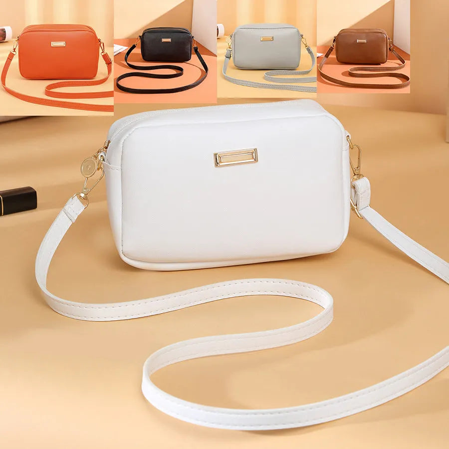 Solid colour PU women's shoulder bag showing three-dimensional pocket, in horizontal square shape.