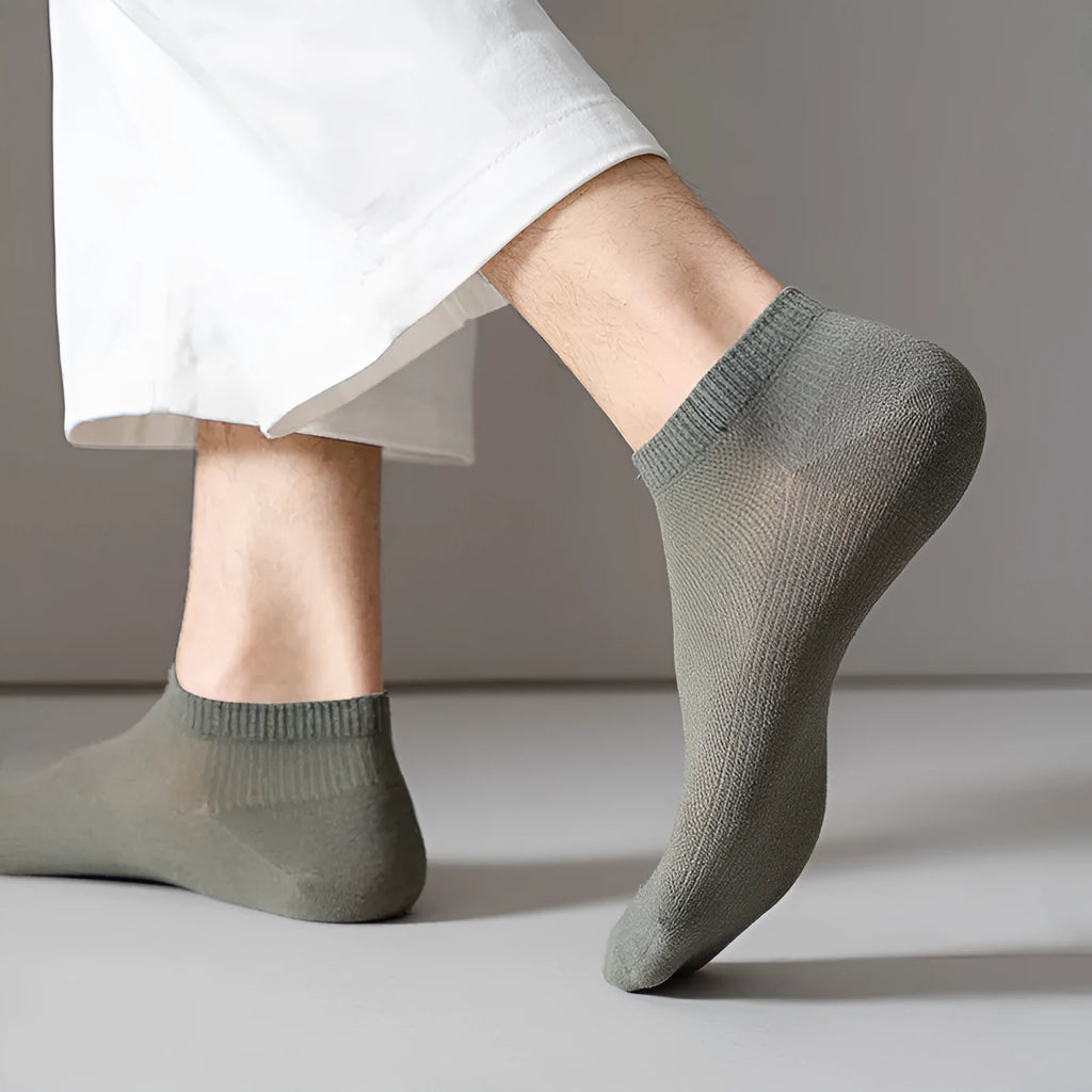 Solid colour low-cut boat socks for men made from polyester, shown in one of six available colours.