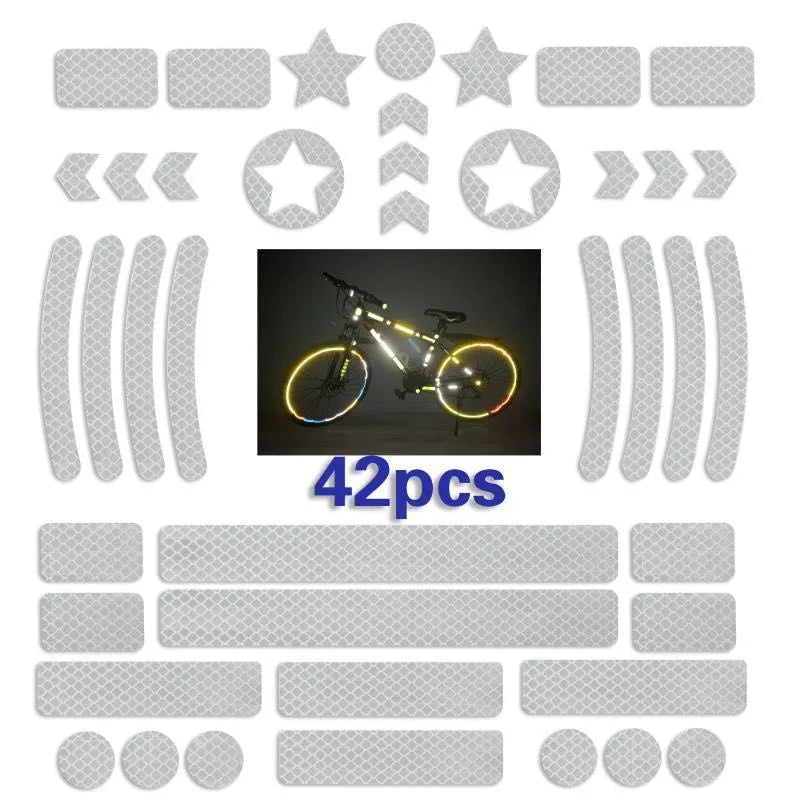Reflective bicycle safety tape with a geometric grid pattern, shown in red, yellow, blue, and white colours.