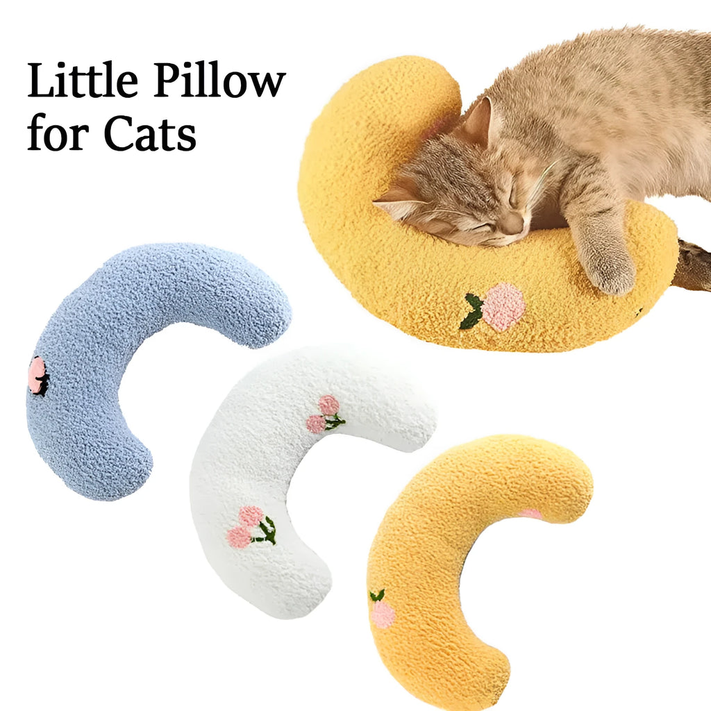 Small half-donut shaped plush pet pillow in blue, showing U-shaped design for cat or small dog neck support.