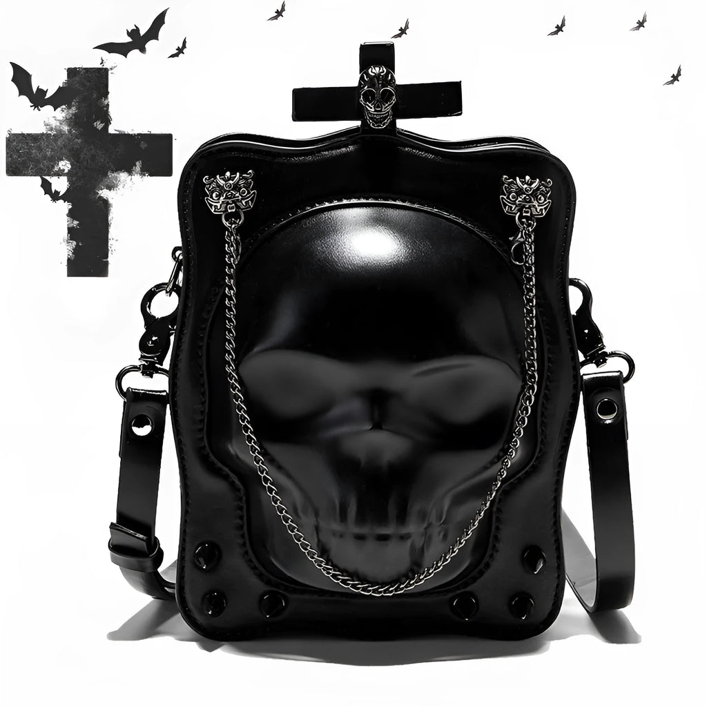 Black Gothic skull crossbody bag with embossed design, square shape, and chain detailing