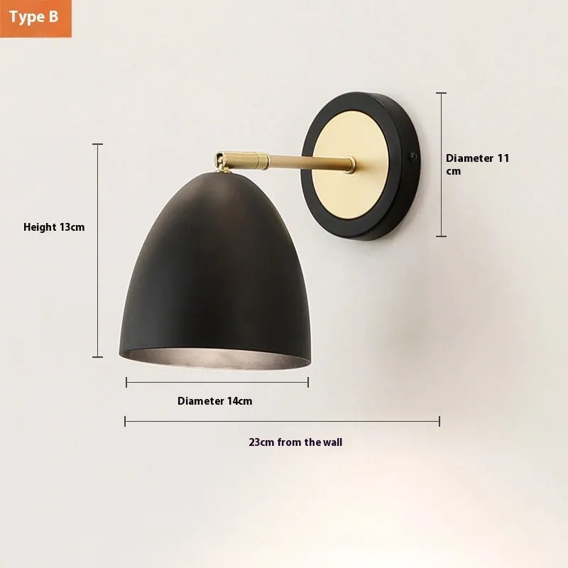 Nordic-style iron wall lamp mounted beside a bed with adjustable LED lighting