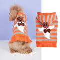 Orange striped Halloween hooded sweater for pets with fur balls on a hanger